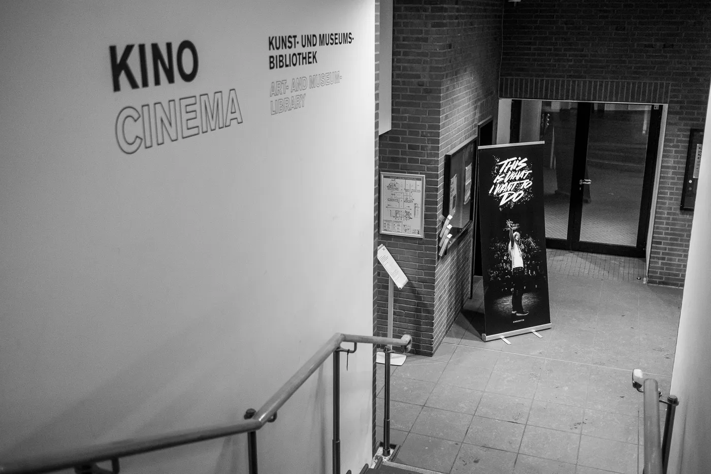 Entrance to the Filmforum cinema with the film’s roll-up banner beside the door