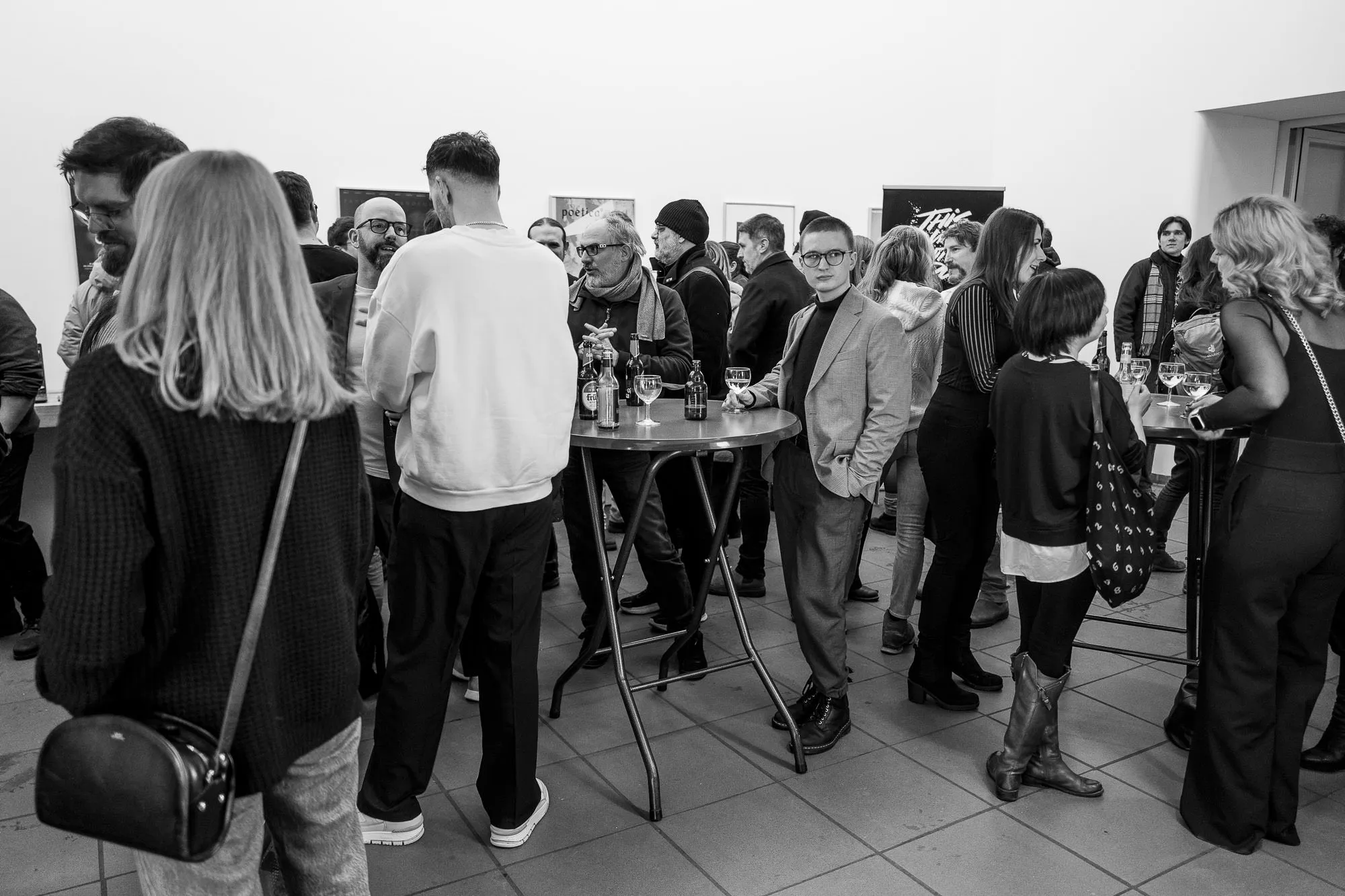 Wide view of the crowded foyer before the screening