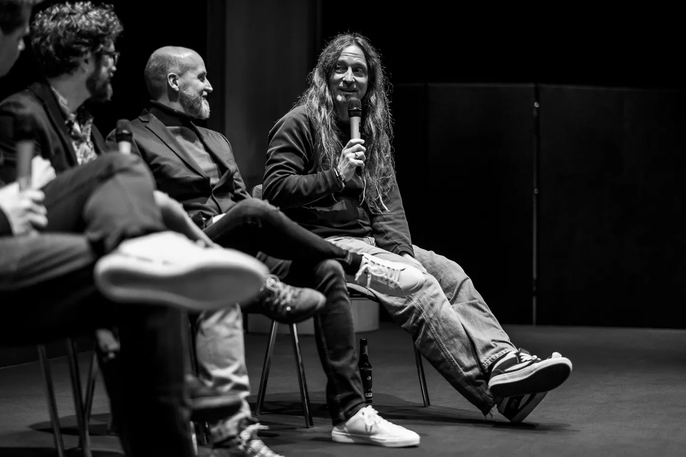 Marc Thiele speaking into a microphone during the Q&A