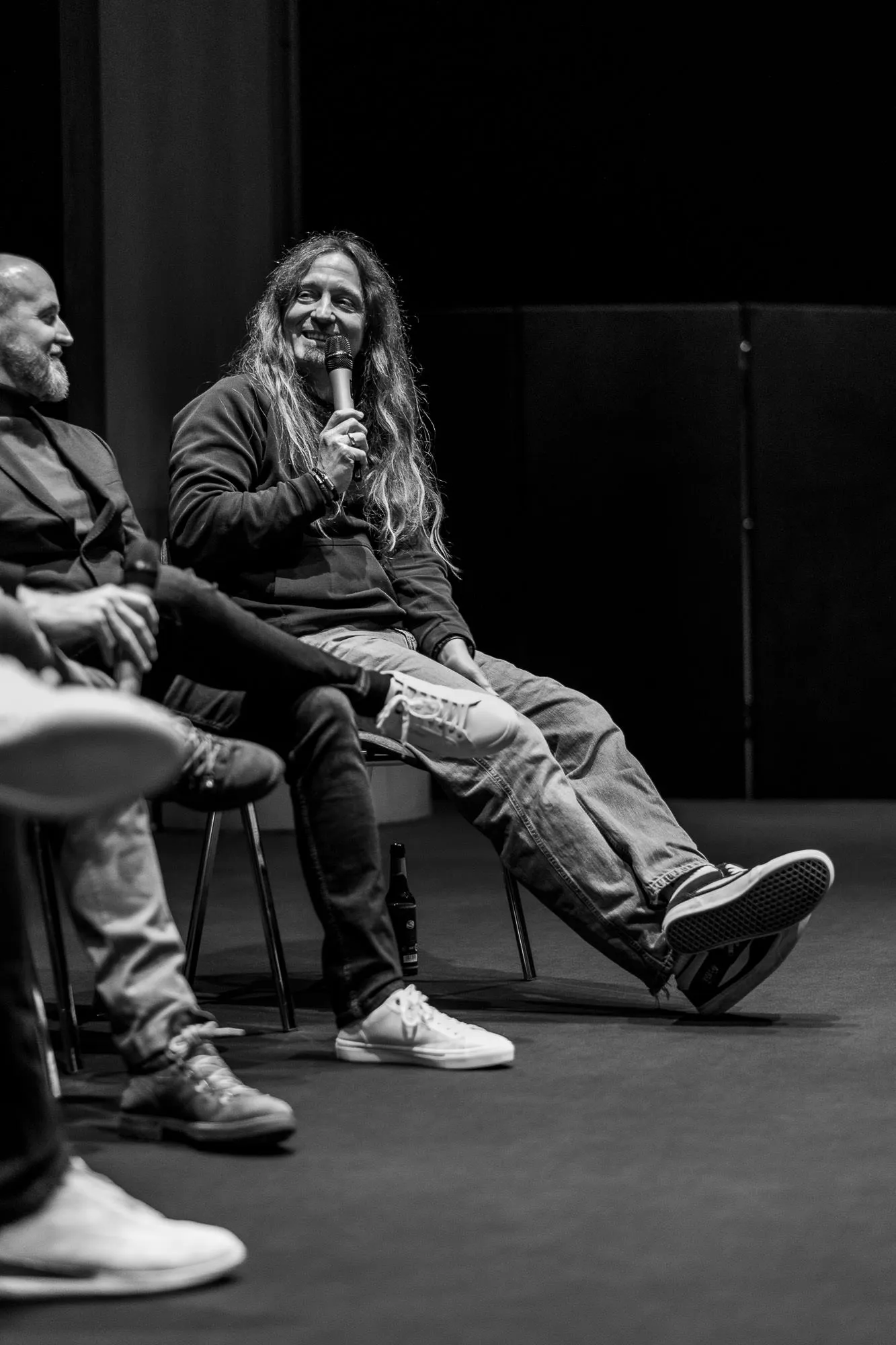 The panel on stage seen from the side